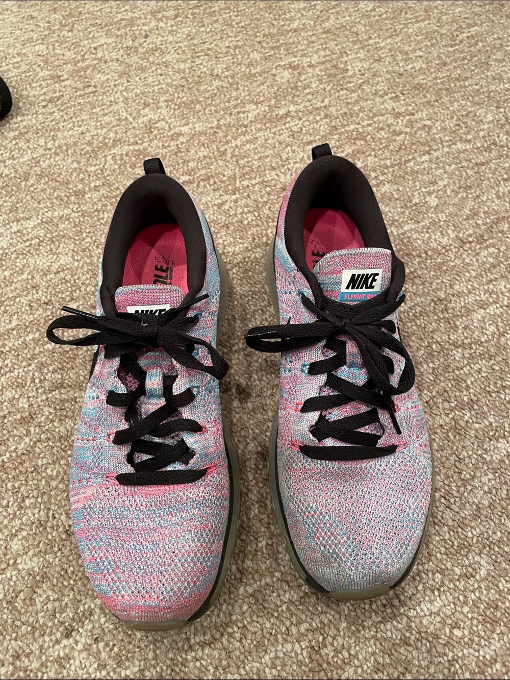 Nike Women’s Pink and Blue Flyknit Running Shoes